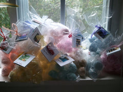 14 bath bombs (select from over 100 fragrances) our Little Bag of Balls (great for dry skin)